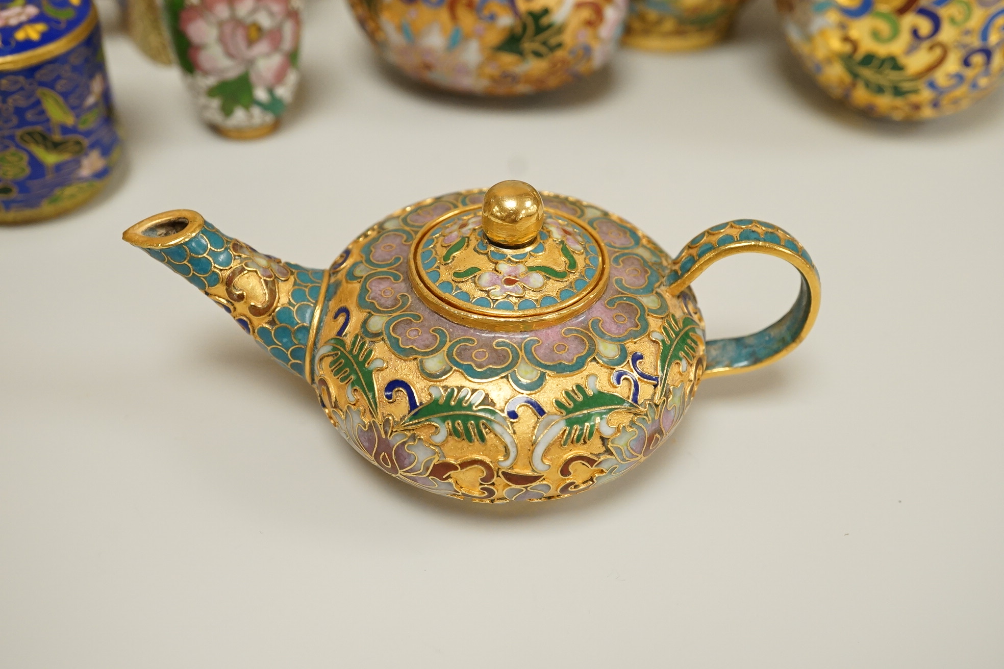A collection of miniature enamel and cloisonné boxes, eggs and a painted rabbit, etc. (11)